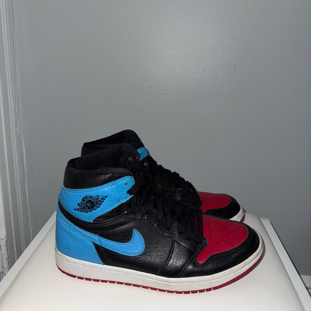 Nike Air Jordan High-Tops in Black, Red, and Blue